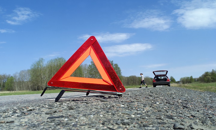 Warning traingle at the side of the road