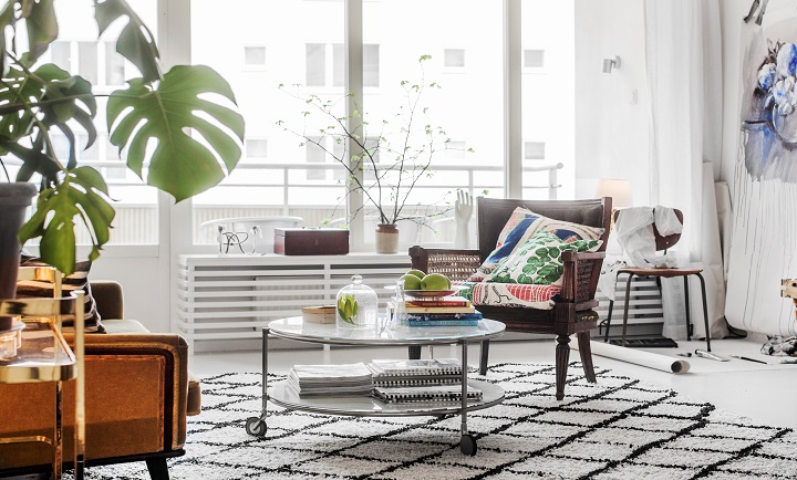 Mixture of furniture and glass wall in artistic living room