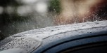 Rain on a car roof in the background in Costa Rica