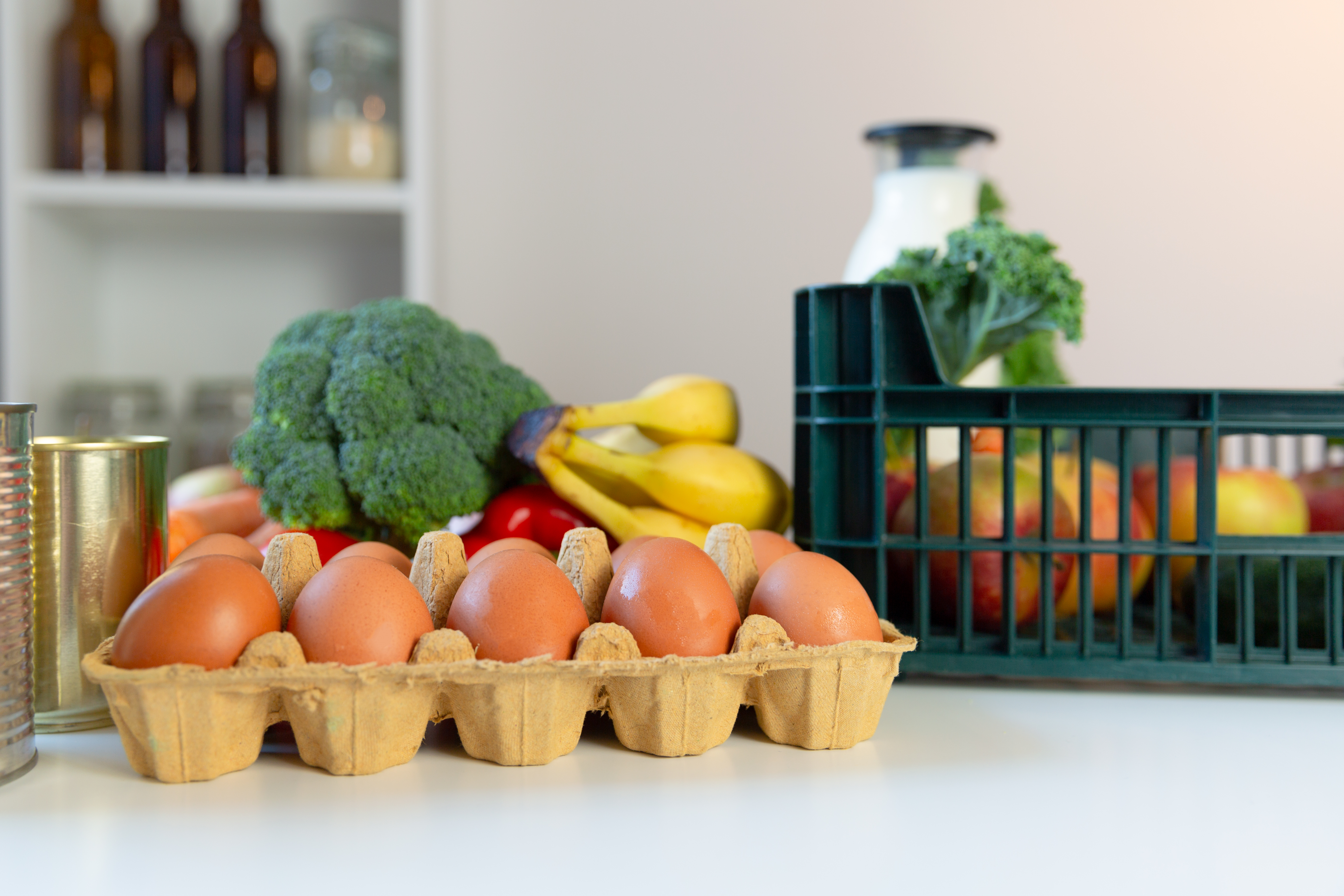 Fresh healthy groceries and vegetables from supermarket in green tray box. Food delivery service