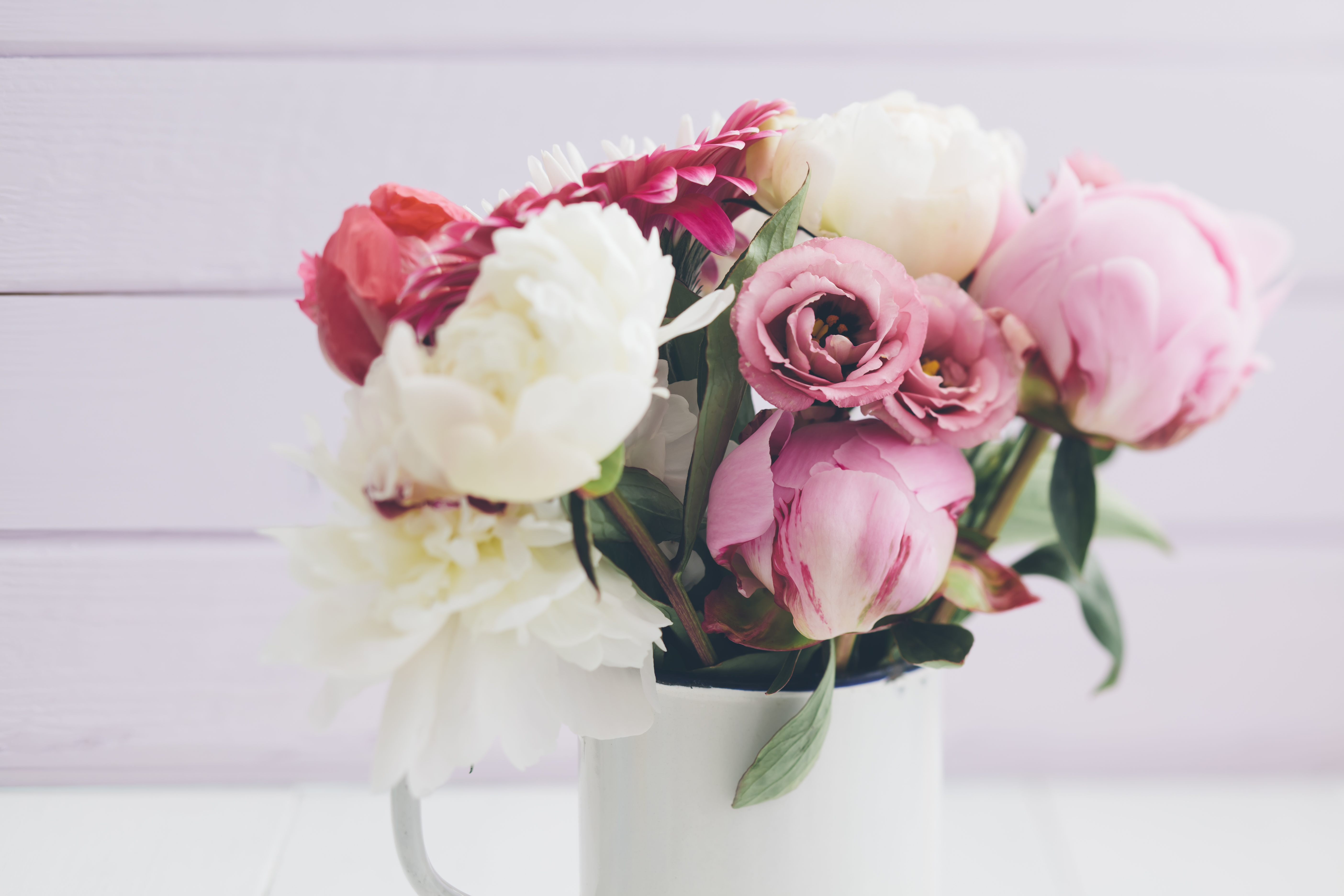 Bouquet of summer flowers on table, close up