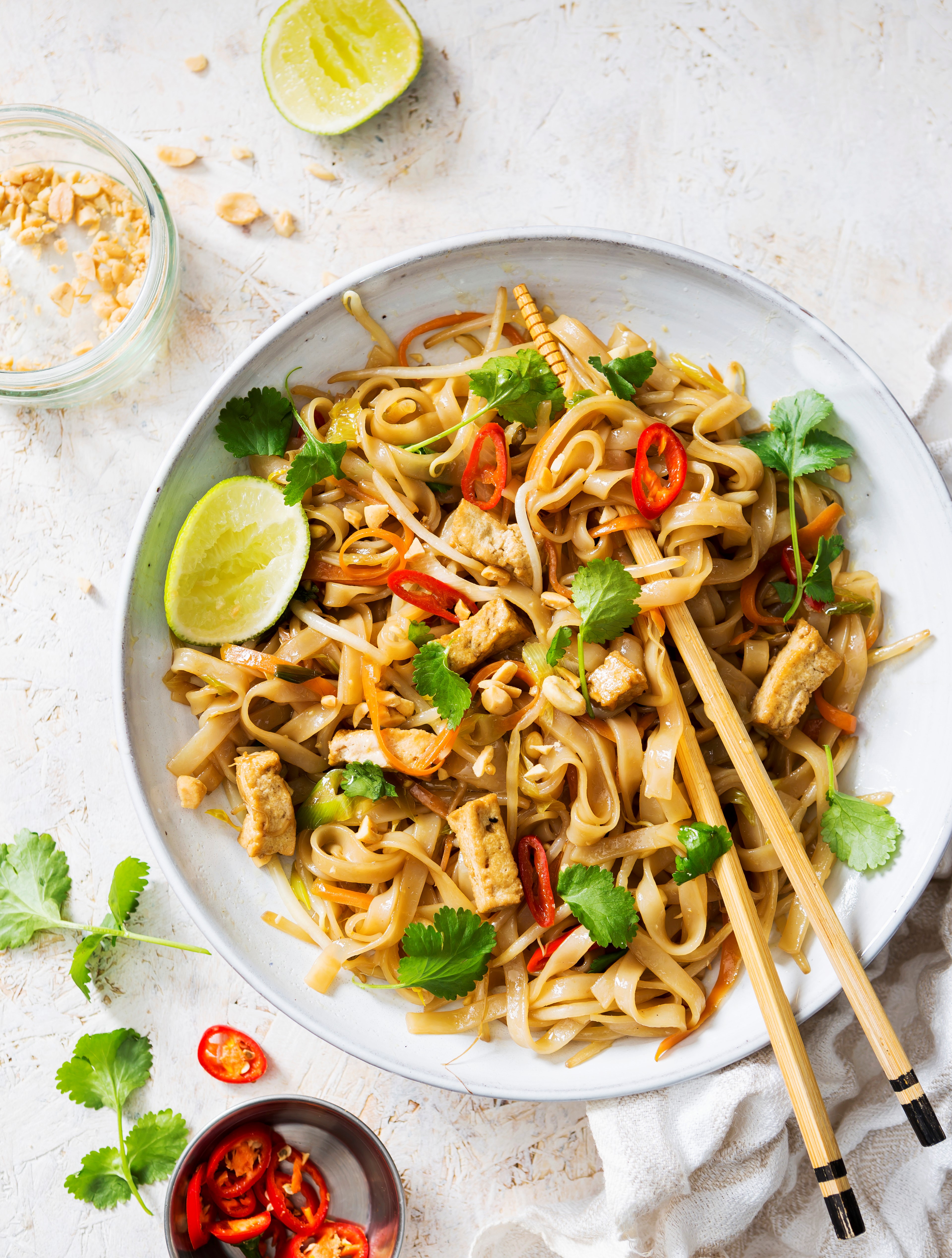 White bowl of vegan tofu Pad Thai noodle dish